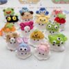Little handmade crocheted ghosts with all kinds of cute hats