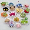 Little handmade crocheted ghosts with all kinds of cute hats