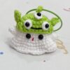 Little handmade crocheted ghosts with all kinds of cute hats
