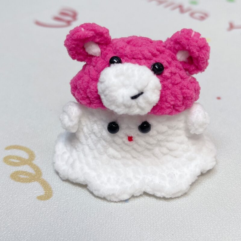 Little handmade crocheted ghosts with all kinds of cute hats