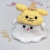 Little handmade crocheted ghosts with all kinds of cute hats