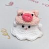 Little handmade crocheted ghosts with all kinds of cute hats