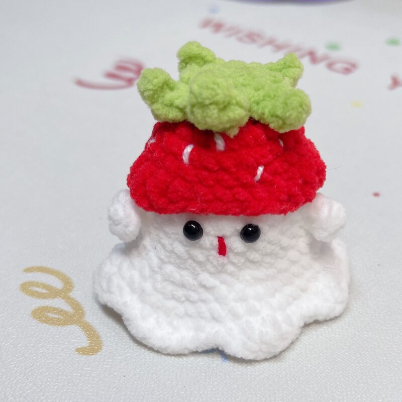 Little handmade crocheted ghosts with all kinds of cute hats